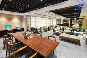 Uma TV ou centro de entretenimento em Hotel PJ Myeongdong