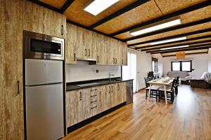 A kitchen or kitchenette at Casa Rural Atalaya House