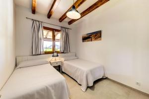 Postel nebo postele na pokoji v ubytování Villa Lidia by Sealand Villas