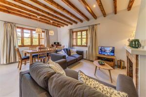 TV a/nebo společenská místnost v ubytování Villa Lidia by Sealand Villas