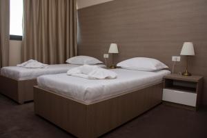 Krevet ili kreveti u jedinici u objektu Hotel Narenta