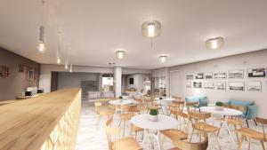 a rendering of a restaurant with tables and chairs at Hotel Grand Nefeli in Vasiliki