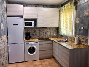 Kuchyň nebo kuchyňský kout v ubytování Apartamento Triana II Bolonia, Tarifa
