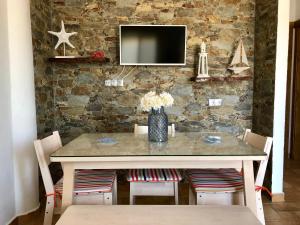 TV a/nebo společenská místnost v ubytování Apartamento Triana II Bolonia, Tarifa