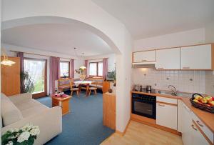 Η κουζίνα ή μικρή κουζίνα στο Ferienwohnungen Baumannsog