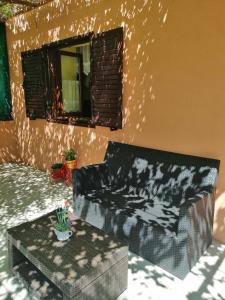 a living room with a couch and a table at Apartments Luce in Kornić