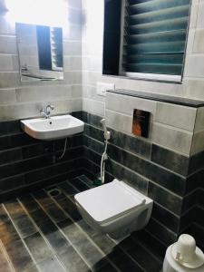 Koupelna v ubytování Sharada Residency