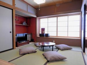 Televiisor ja/või meelelahutuskeskus majutusasutuses 富士山金魚 Fujisan Kingyo
