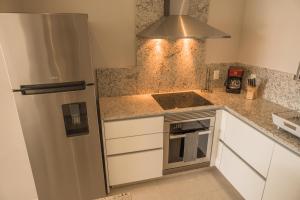 Dapur atau dapur kecil di ApartHotel Ebb Ti Kaan Tulum-Luxury Condos-