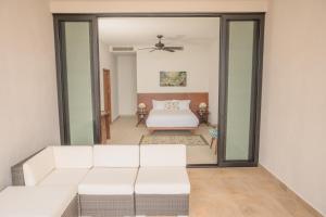 Katil atau katil-katil dalam bilik di ApartHotel Ebb Ti Kaan Tulum-Luxury Condos-