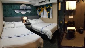 Letto o letti in una camera di Star City Hotel