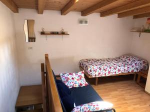 Ένα ή περισσότερα κρεβάτια σε δωμάτιο στο Cà Batuffolin