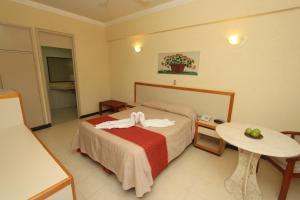 Postel nebo postele na pokoji v ubytování Hotel Ferri + 23 fotografií