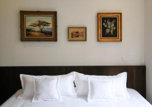 Ein Bett oder Betten in einem Zimmer der Unterkunft Hotel Museo San Moritz