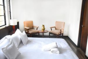 Ein Sitzbereich in der Unterkunft Hotel Museo San Moritz