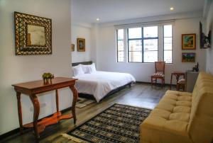 Ein Bett oder Betten in einem Zimmer der Unterkunft Hotel Museo San Moritz