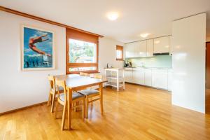 Kuchyň nebo kuchyňský kout v ubytování LAAX Homes - Casa Miro Nr 6