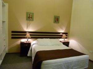 A bed or beds in a room at La Posada Del Fraile