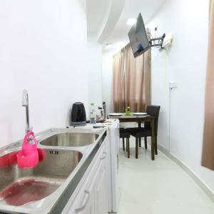 A kitchen or kitchenette at Resting View One Bedroom Apartment