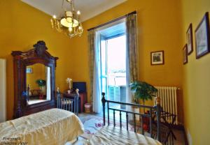 Postel nebo postele na pokoji v ubytování B&B Casa Cavalli