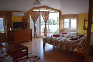 En eller flere senge i et værelse på Central Palace