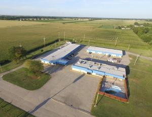 an overhead view of a large building with blue roofs at Regency Inn in Concordia