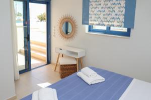 Ένα ή περισσότερα κρεβάτια σε δωμάτιο στο ANGIO VILLAS SPA