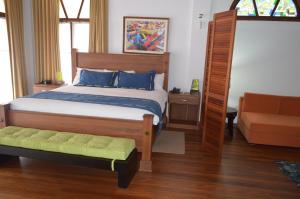 Cama o camas de una habitación en Casa Ceibo Hotel