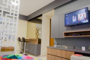 ครัวหรือมุมครัวของ Apartamento aconchegante em frente ao Shopping JL