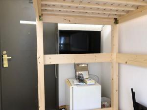 TV a/nebo společenská místnost v ubytování Hotel Mirai