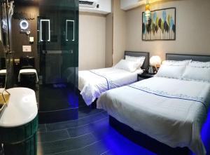 Letto o letti in una camera di Star City Hotel