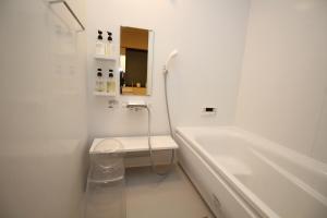Ванна кімната в Nachiya