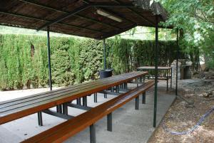 Zahrada ubytování Atico en Biescas con Piscina, Tenis y Barbacoa