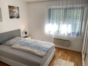 Posteľ alebo postele v izbe v ubytovaní Ferienhaus Wertner