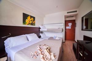 Postel nebo postele na pokoji v ubytování Alisei Palace Hotel