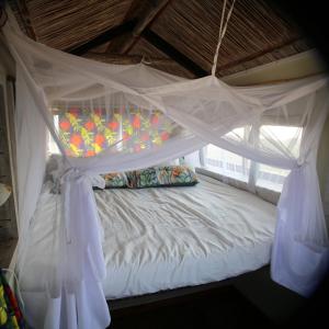 Letto o letti in una camera di Tree House Villa