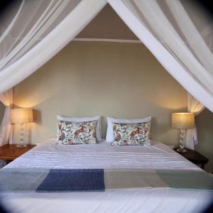 Letto o letti in una camera di Tree House Villa
