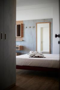 Postel nebo postele na pokoji v ubytování Alisei Palace Hotel