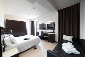 TV a/nebo společenská místnost v ubytování Alisei Palace Hotel