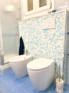 A bathroom at Indipendenza Luxury Apartments