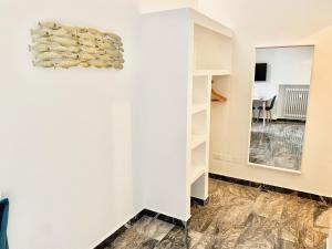 A kitchen or kitchenette at Indipendenza Luxury Apartments