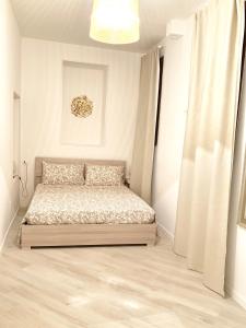 A bed or beds in a room at Indipendenza Luxury Apartments