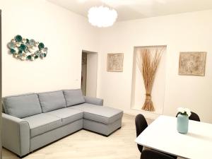 A seating area at Indipendenza Luxury Apartments
