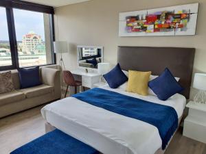 Katil atau katil-katil dalam bilik di Manhattan Luxury Apartments