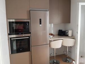 Kuchyň nebo kuchyňský kout v ubytování luxury aparment in Torrequebrada Benalmadena