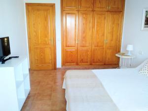 Łóżko lub łóżka w pokoju w obiekcie Villa la 29
