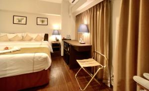 Postel nebo postele na pokoji v ubytování Le Tour Hotel Akihabara Ekimae 楽途ホテル秋葉原駅前店