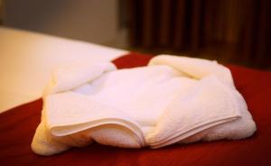 Posteľ alebo postele v izbe v ubytovaní Hotel Wayanad Square