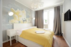 Posteľ alebo postele v izbe v ubytovaní Apartamenty Bliżej morza - visitopl