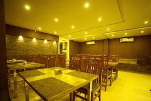 Posedenie v ubytovaní Hotel Wayanad Square